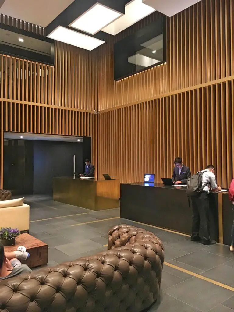 Reception area with comfy sofas at G Hotel Kelawai
